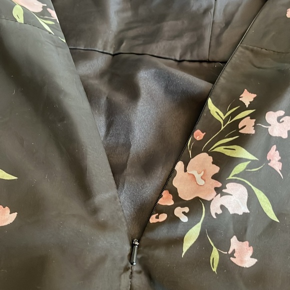 Jenny Yoo Cassie
Flutter Sleeve
Surplice Gown
Black with Floral Pattern. - Picture 8 of 17